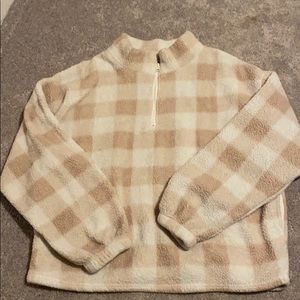 pink checkered fuzzy half-zip sweatshirt